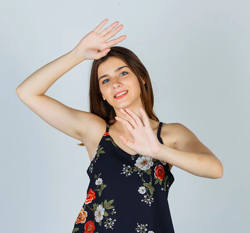 Confident person in Dubai shaking hands, suggesting successful hyperhidrosis treatment.